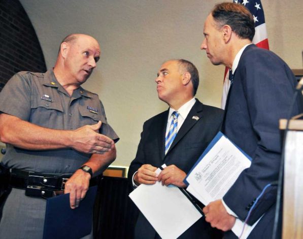 NYSP Major William Sprague, NYS Comptroller Thomas DiNapoli and  District Attorney James Murphy discuss an investigation of theft of  public funds in Saratoga County